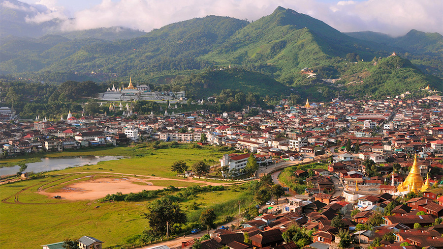A classic view of Mogok town, dominated by the Chan Thar Gyi Pagoda (left) and arranged around its lake, which was created from a gem mine worked during British colonial times.